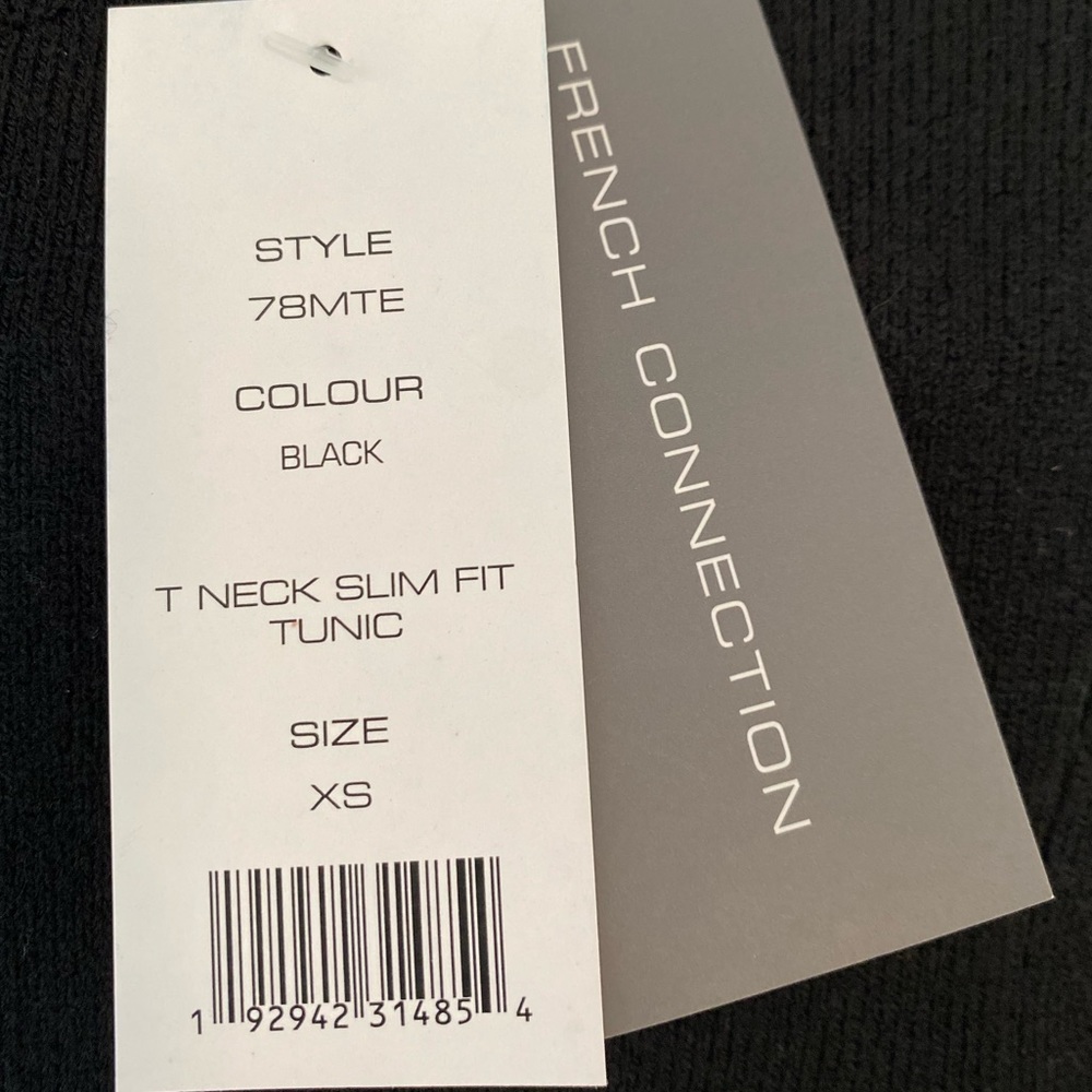 Black turtle neck T neck slim tunic. Soft and delicate and brand new condition.